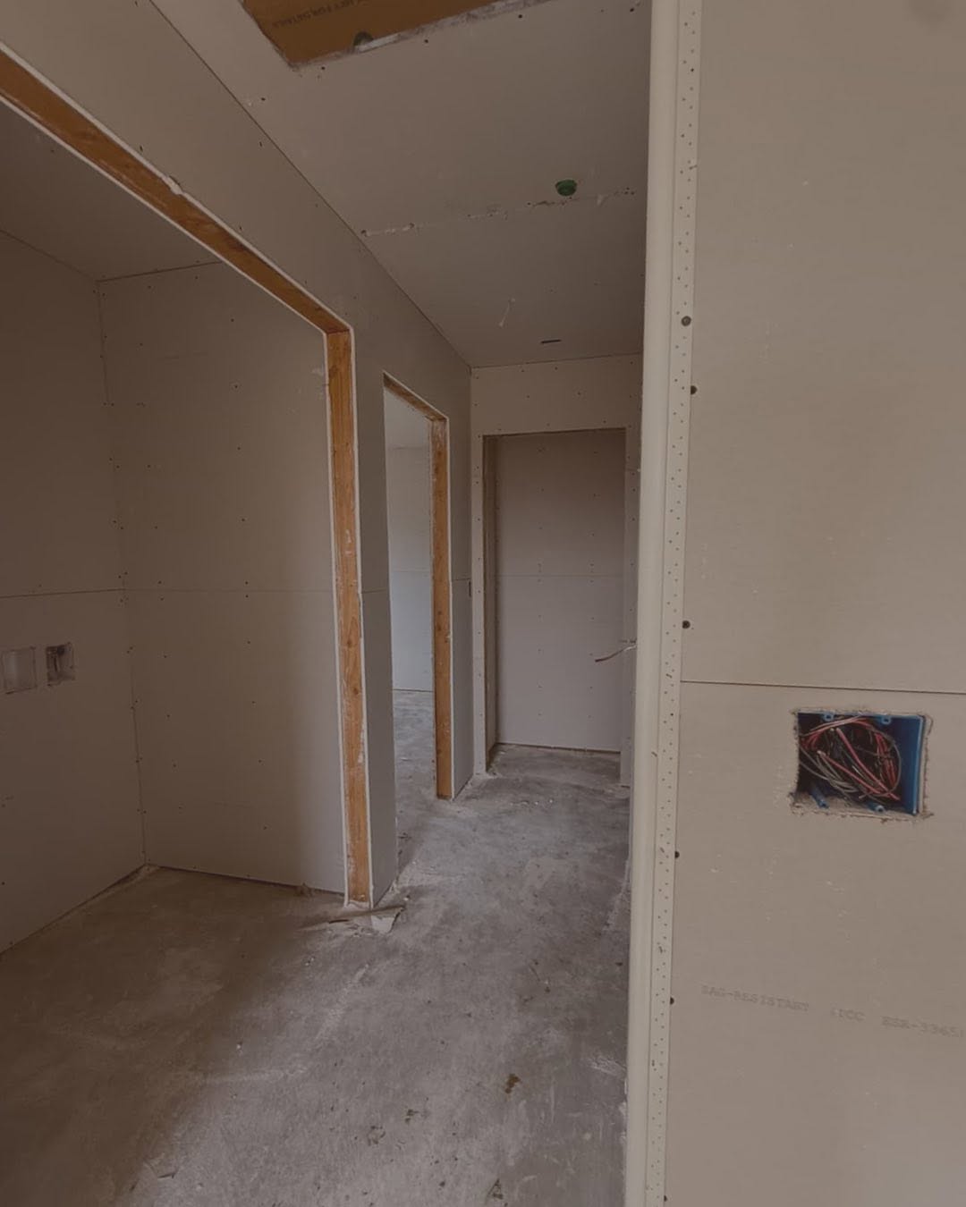Finished hallway with doors, ready for paint