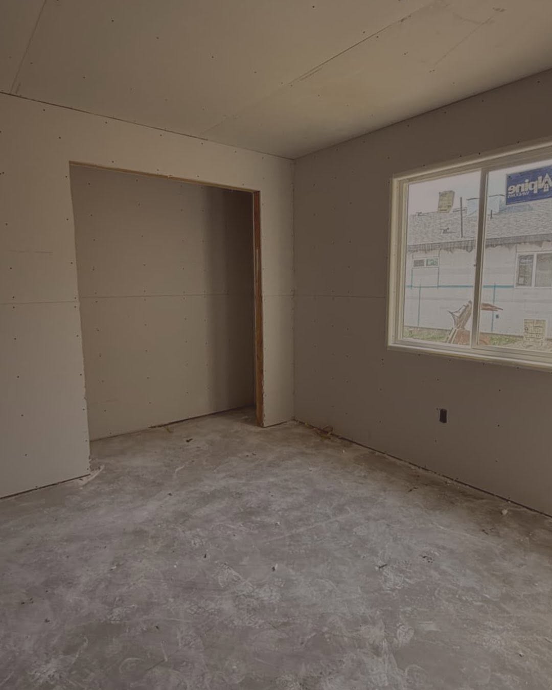 Finished room with clean walls and window