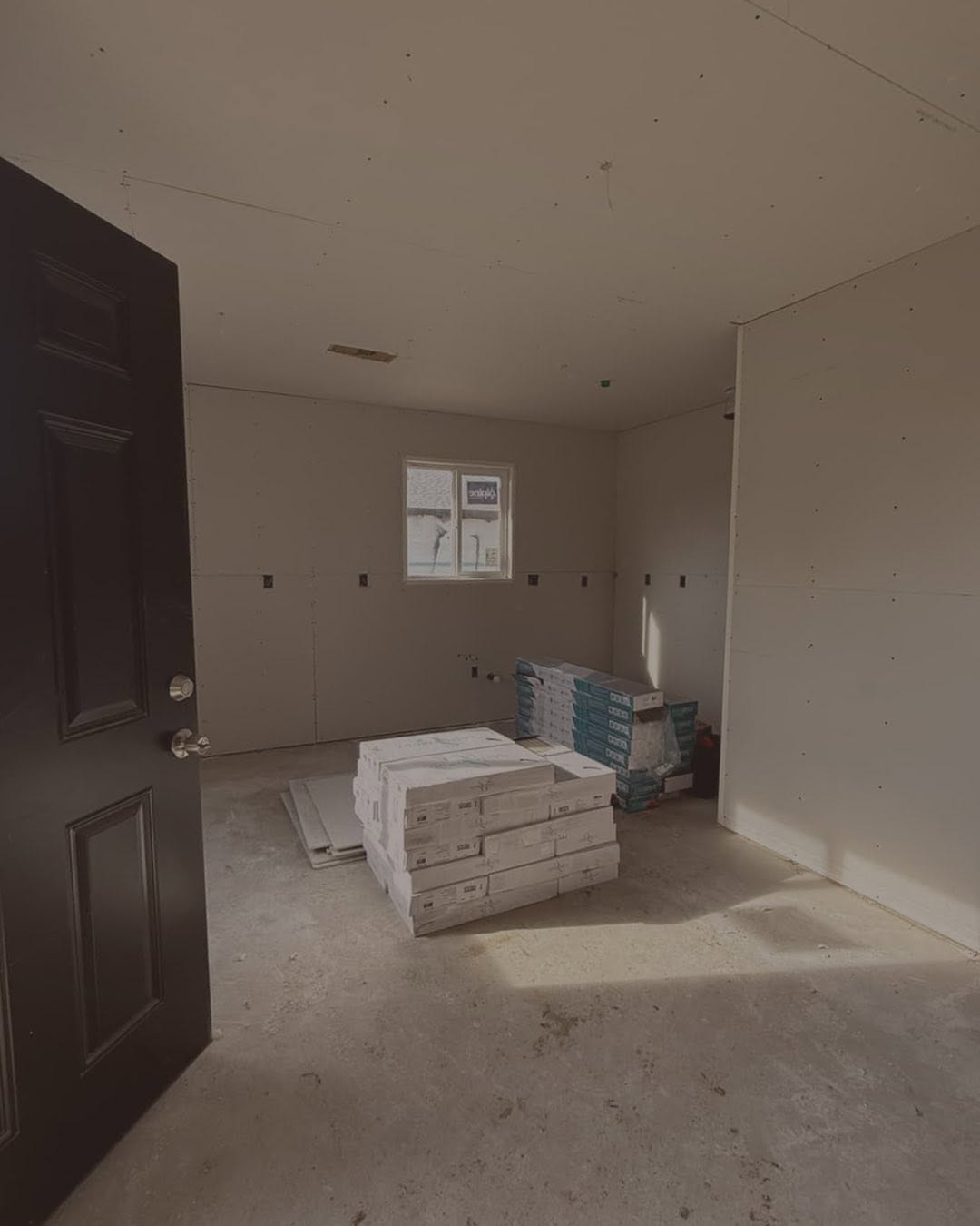 Repaired and patched drywall section