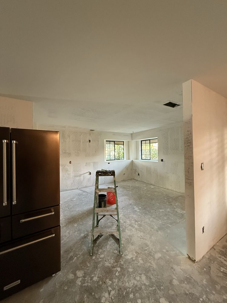 Freshly hung drywall in a residential room